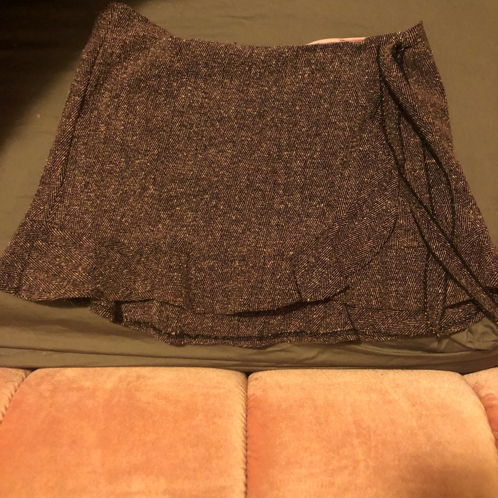 Tweed like mini skirt.